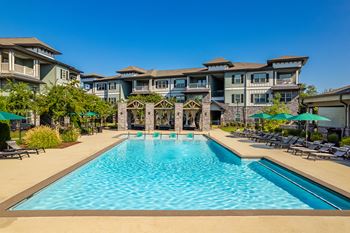 Sparkling swimming pool w/ cabanas